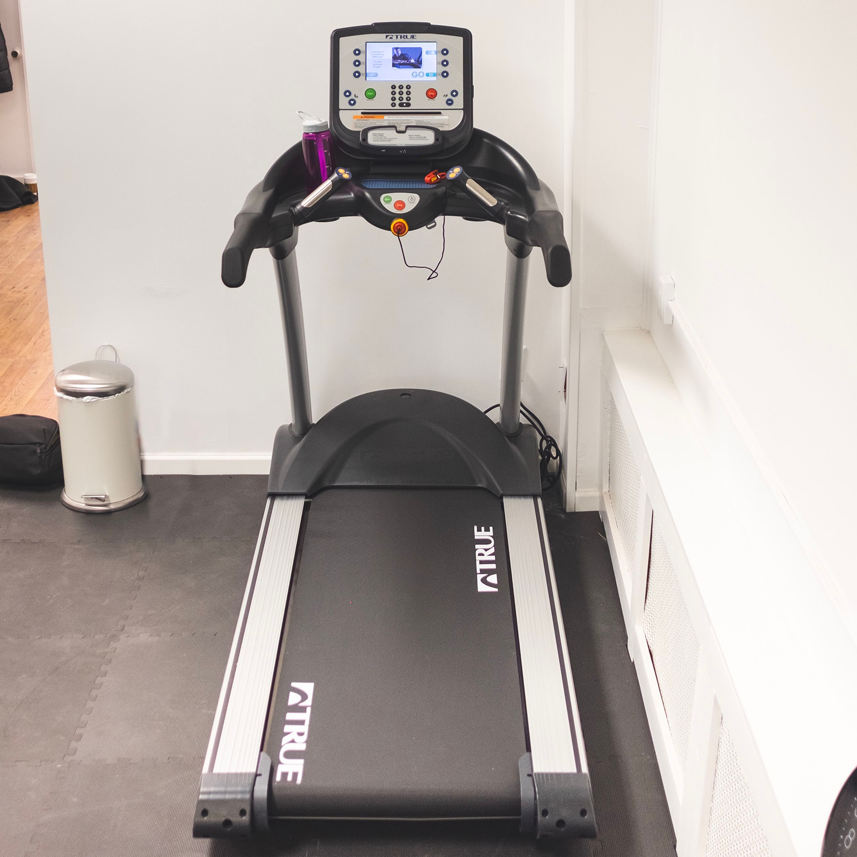 An advanced tread machine is sitting in a room, perfect for personal training sessions and women's fitness, located in Philadelphia.