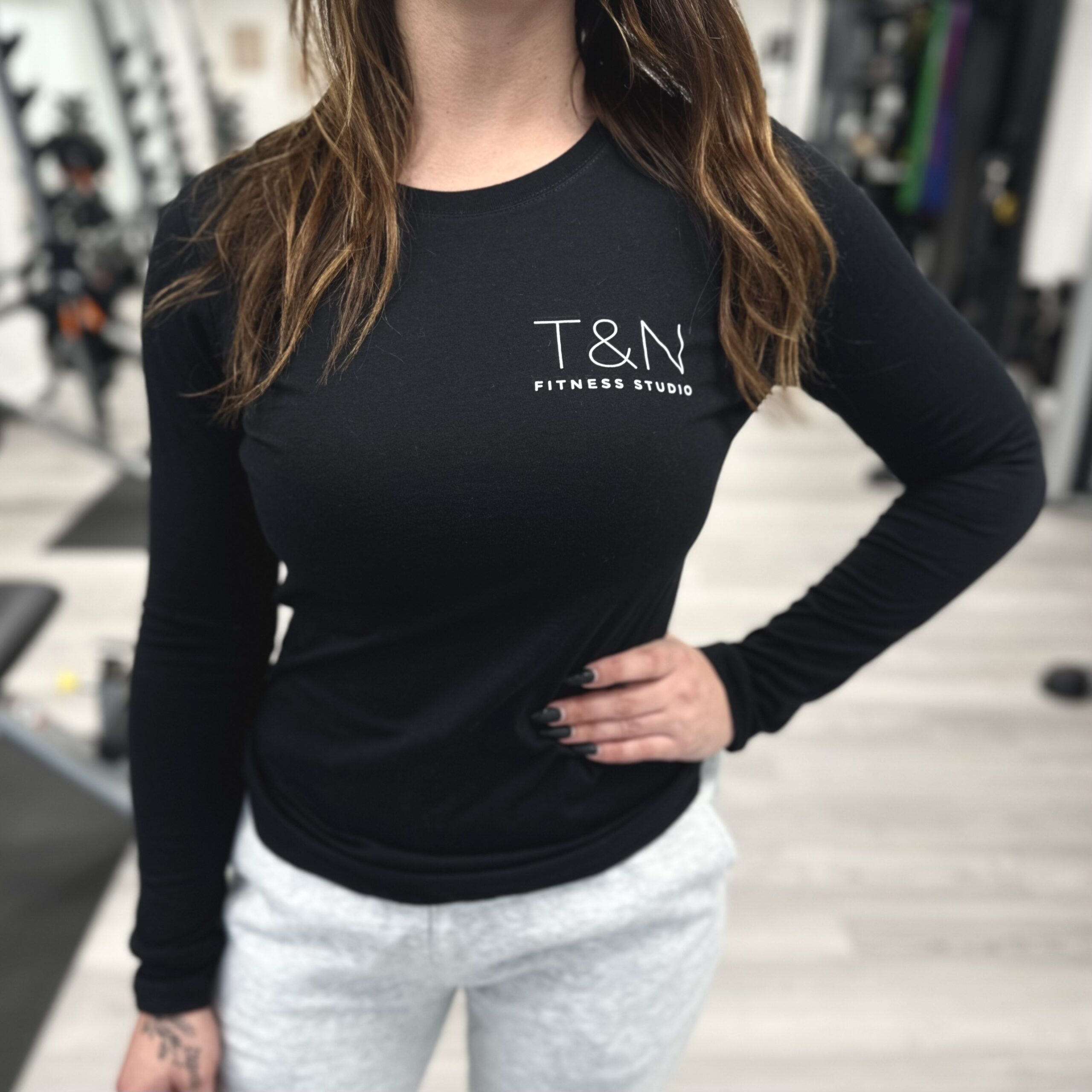 Merchandise: Tnn women's long sleeve tee.